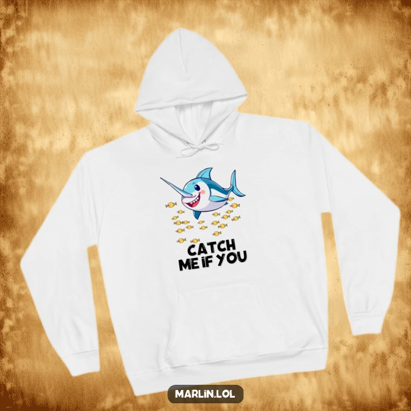 Funny Marlin Hoodie: A smiling marlin character humorously zooms past a school of tiny fish, offering warmth and style.